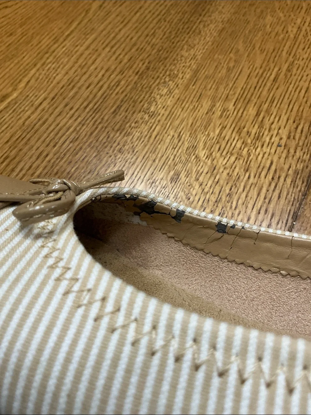 Woman’s AEROSOLES tan/white stripe flat with toe cap. Size 8.5. Bow.
